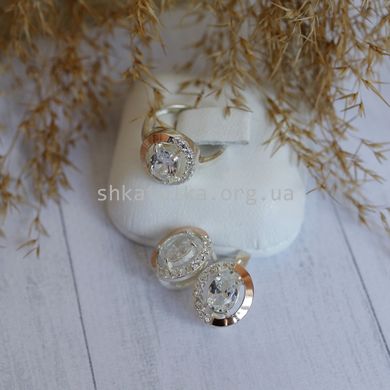 Комплект серебряный с золотыми вставками кольцо и сережки с белыми овальными фианитами