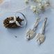 Комплект серебряный Крылья Ангела кольцо и сережки с подвесками и белыми цирконами капельками