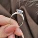 Серебряное кольцо с золотыми вставками и крупным фианитом круглой огранки