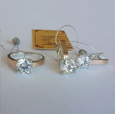 Комплект серебряный с золотыми вставками кольцо и сережки с цирконом